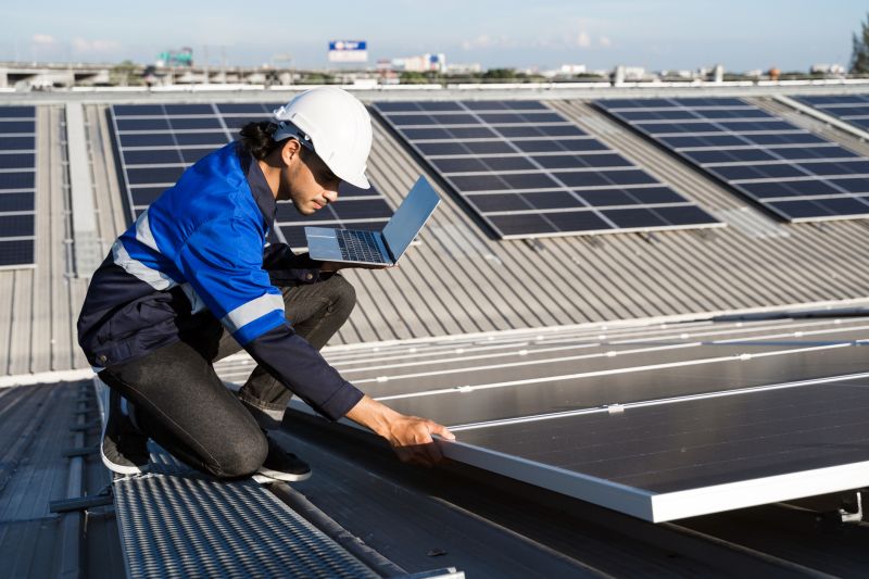 Solar Panel Technician at Work